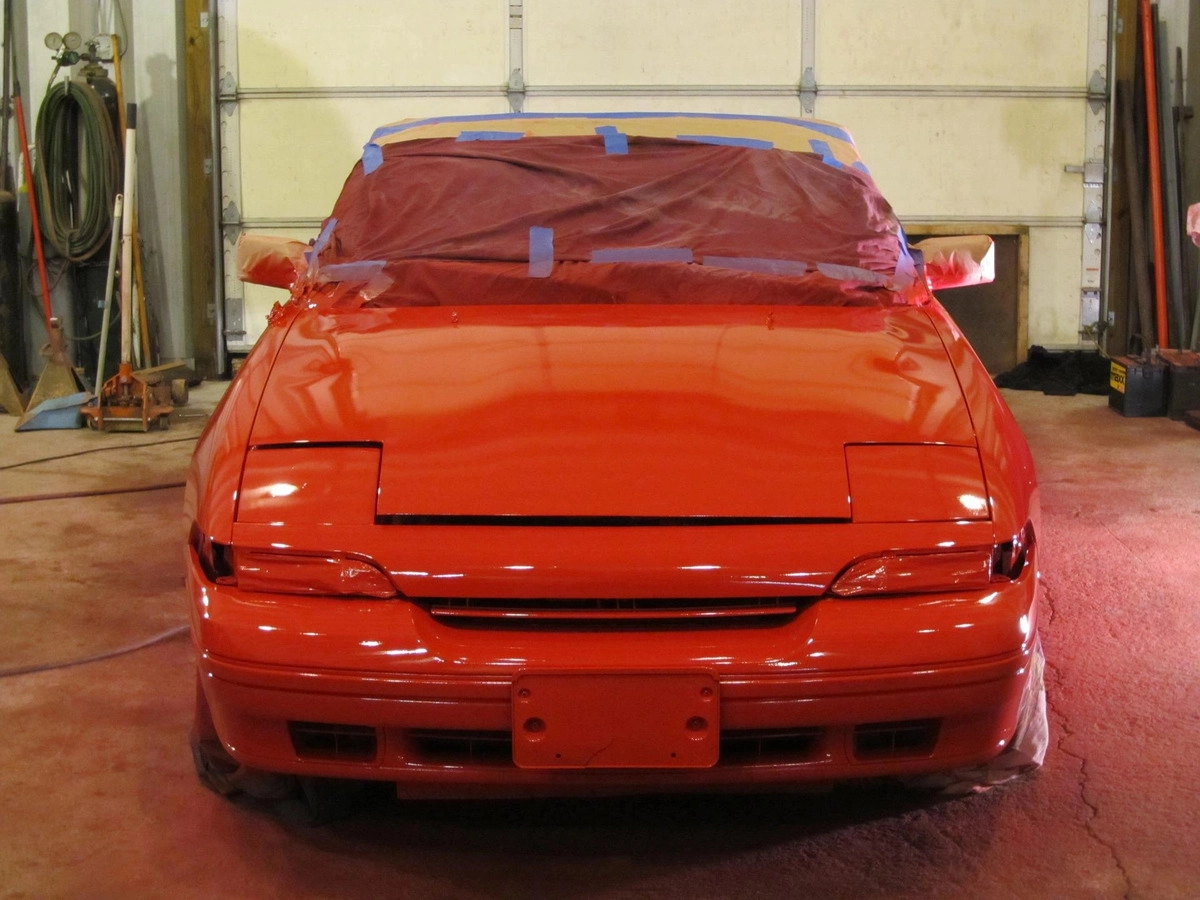 How much paint or spray cans do I need to paint a car?